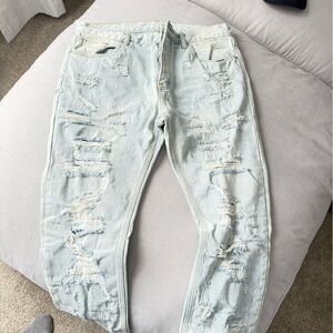 Distressed Light Blue Jeans